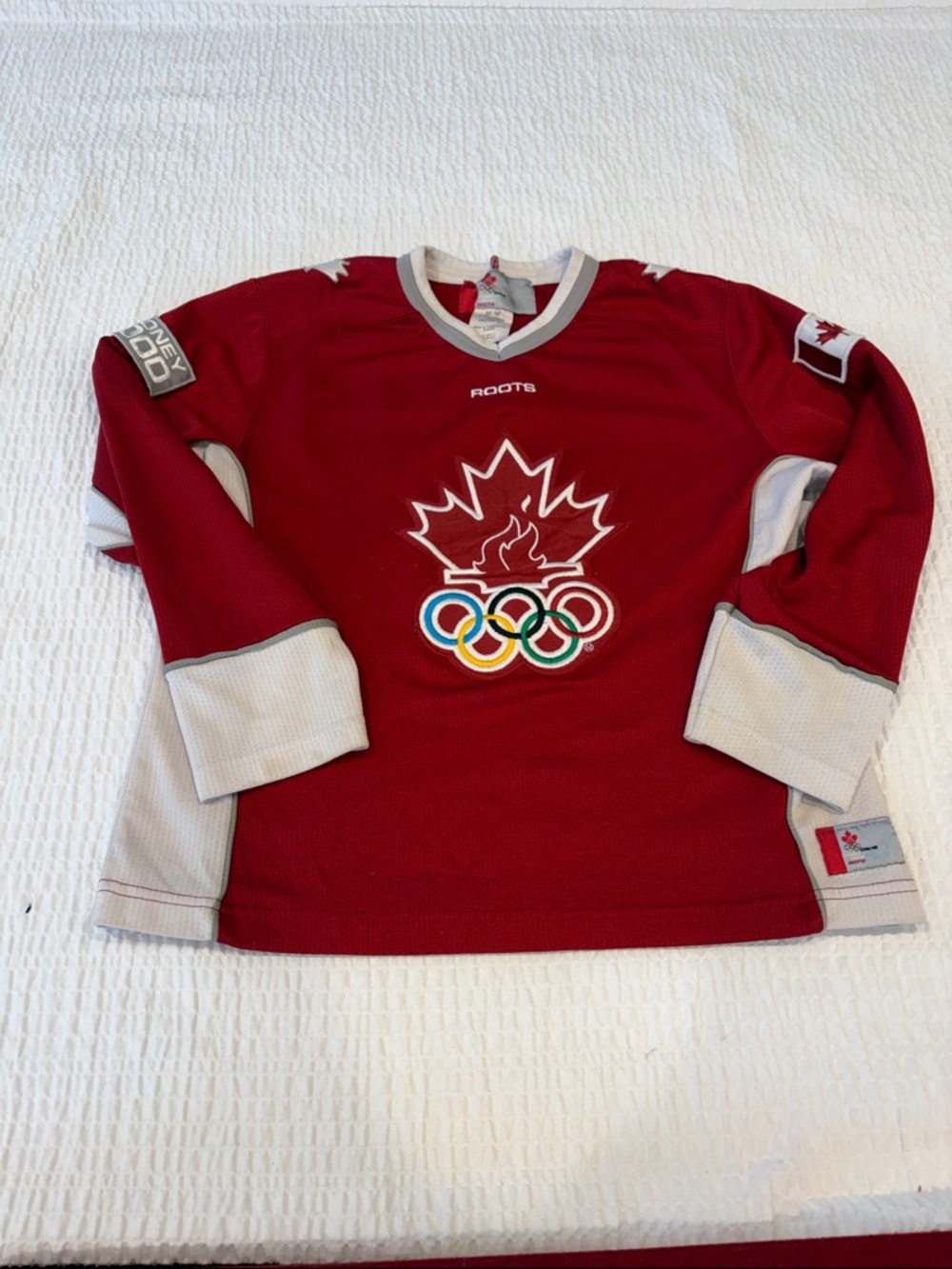 Roots Vintage Red and White 2000 Sydney Olympics Jersey
Women’s size M